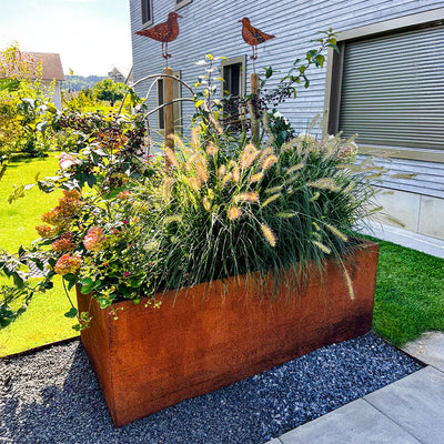 Parterre surélevé avec main courante en rouille noble